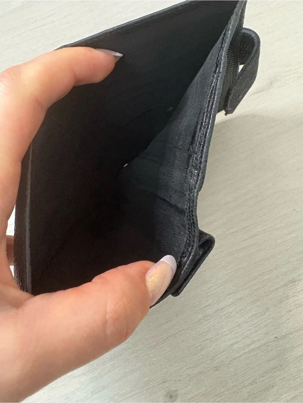Salvatore Ferragamo Black Textured Leather Wallet with Gold Buckle